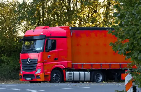 red lorry on road
