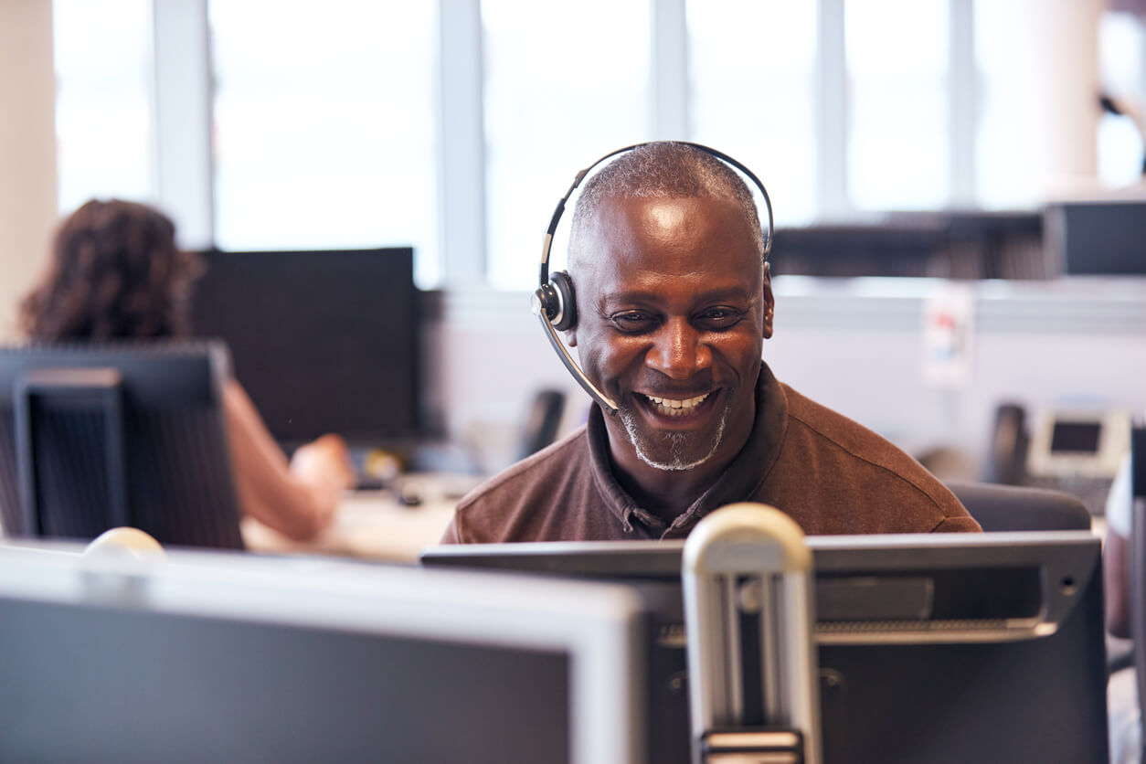 Person smiling on the phone