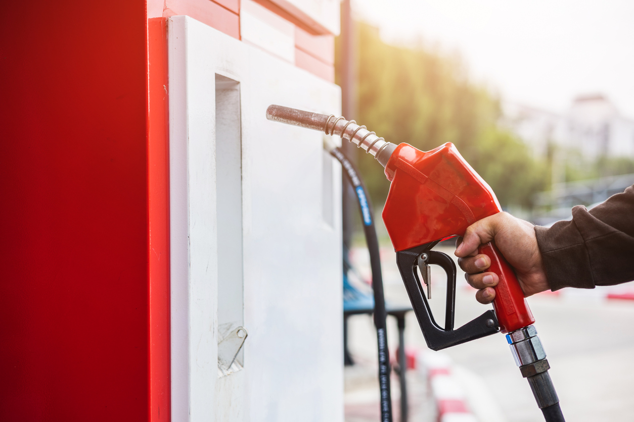 Person filling up their vehicle with petrol