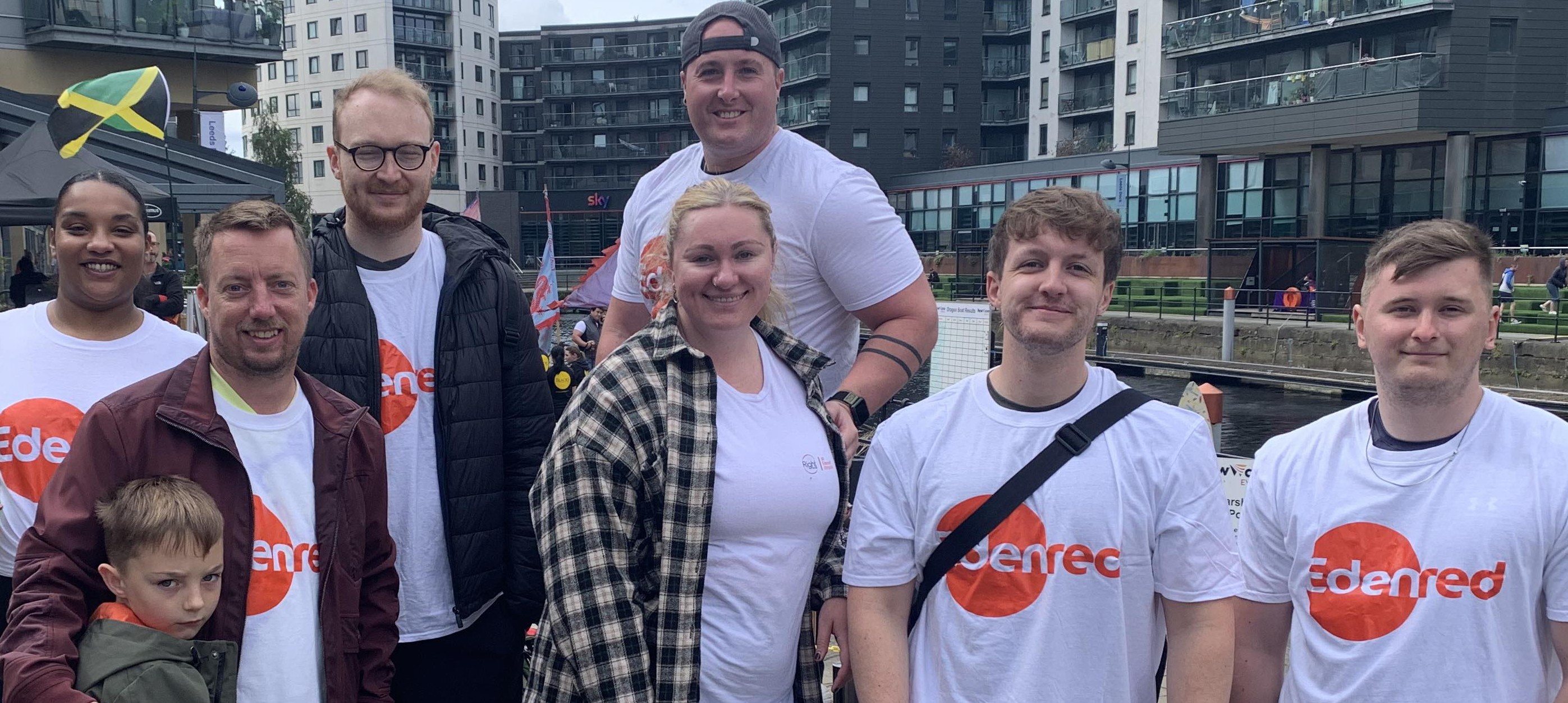 Group of volunteers by a dock